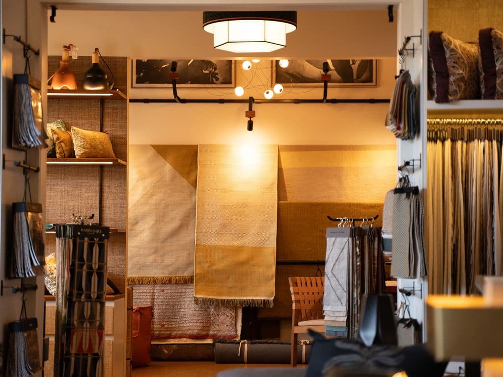 Designer selecting fabric samples